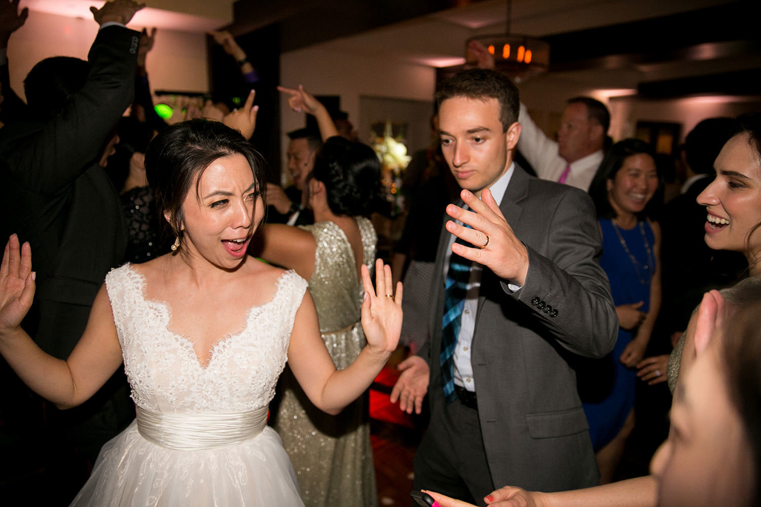 bride and groom dancing at reception