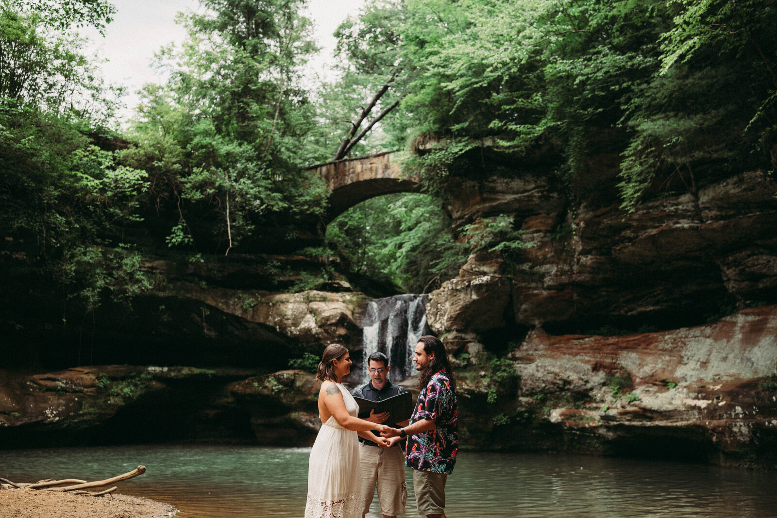 Couple exchange vows at their ceremomy at Old Mans cave in Hocking Hills  Ohio