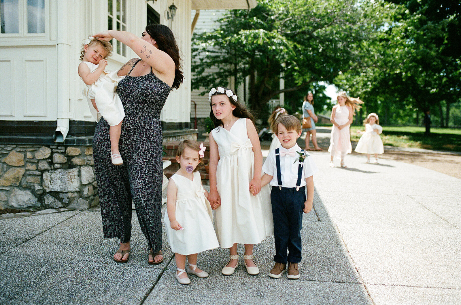 flower girls and ring bearer on film before a wedding at Legacy Farms