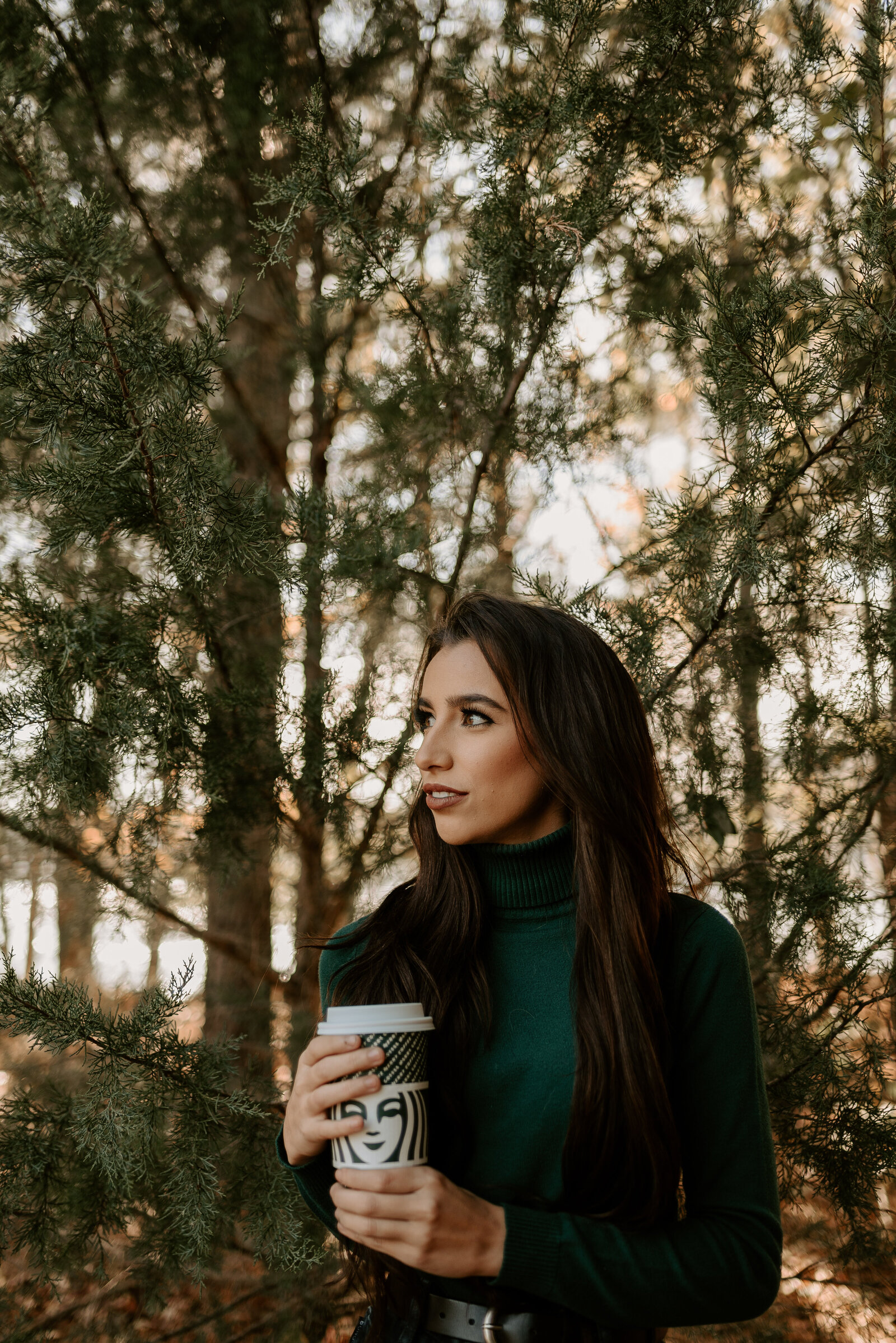Holding starbucks cup even though we don't like coffee