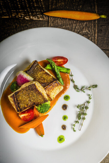 Fish filet in bellpepper sauce