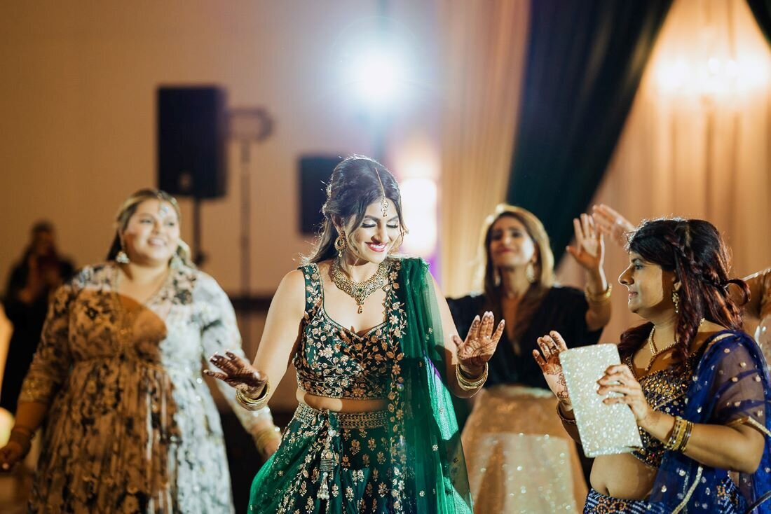 Traditional elegance captured in Ottawa, Indian bride in stunning lehenga, makeup artistry by Red Carpet Glamour.