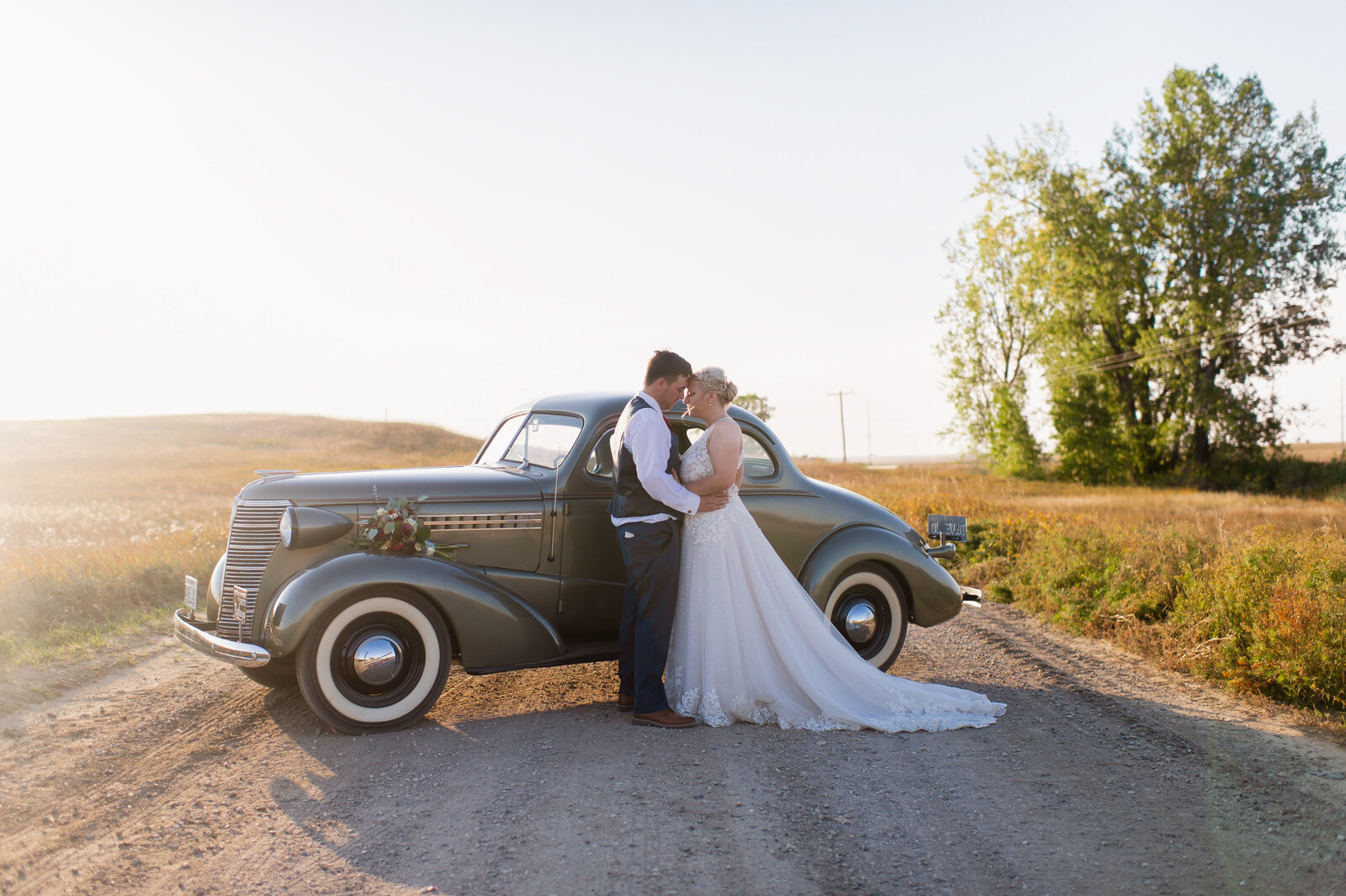 bride groom classic car sunset dirt road manhattan kansas wedding photographer-2