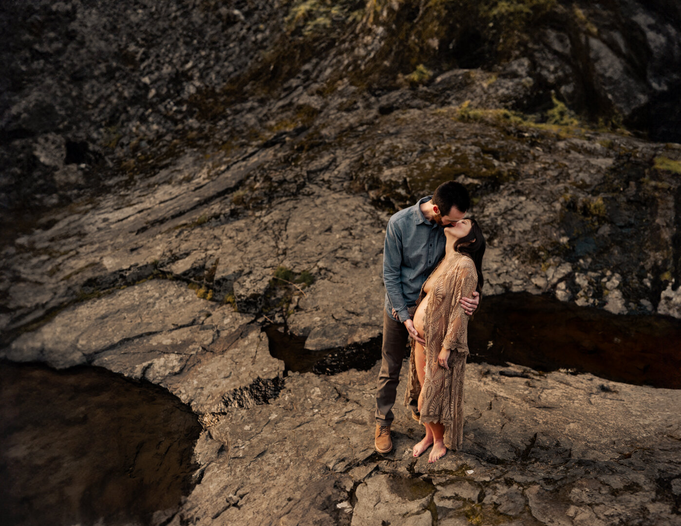 pregnant woman posing for photos at the beach for Portland maternity photographer