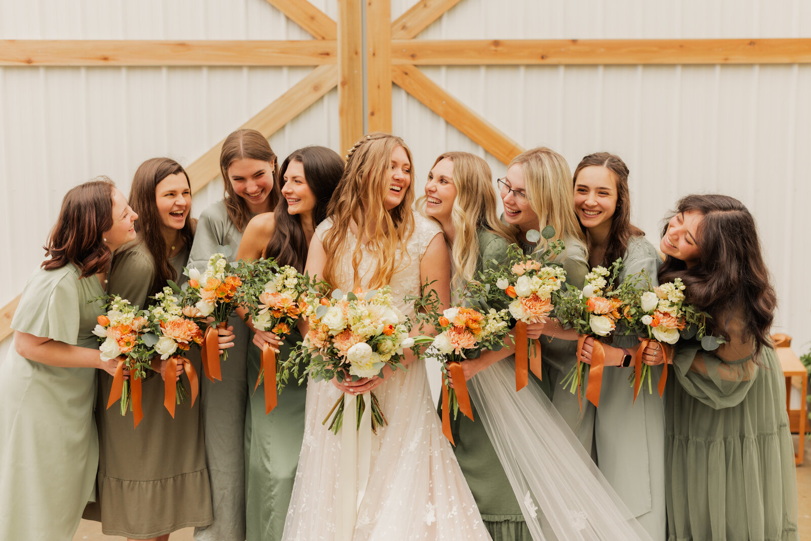 bride with her bridesmaids in Logan, Utah celebrating her wedding day