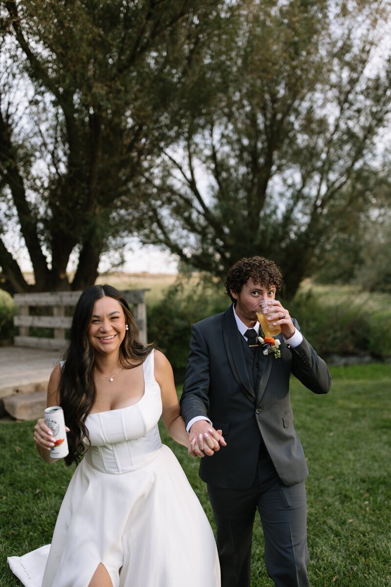 Bride and groom laughing by idaho wedding photographer Erica Rochelle photography
