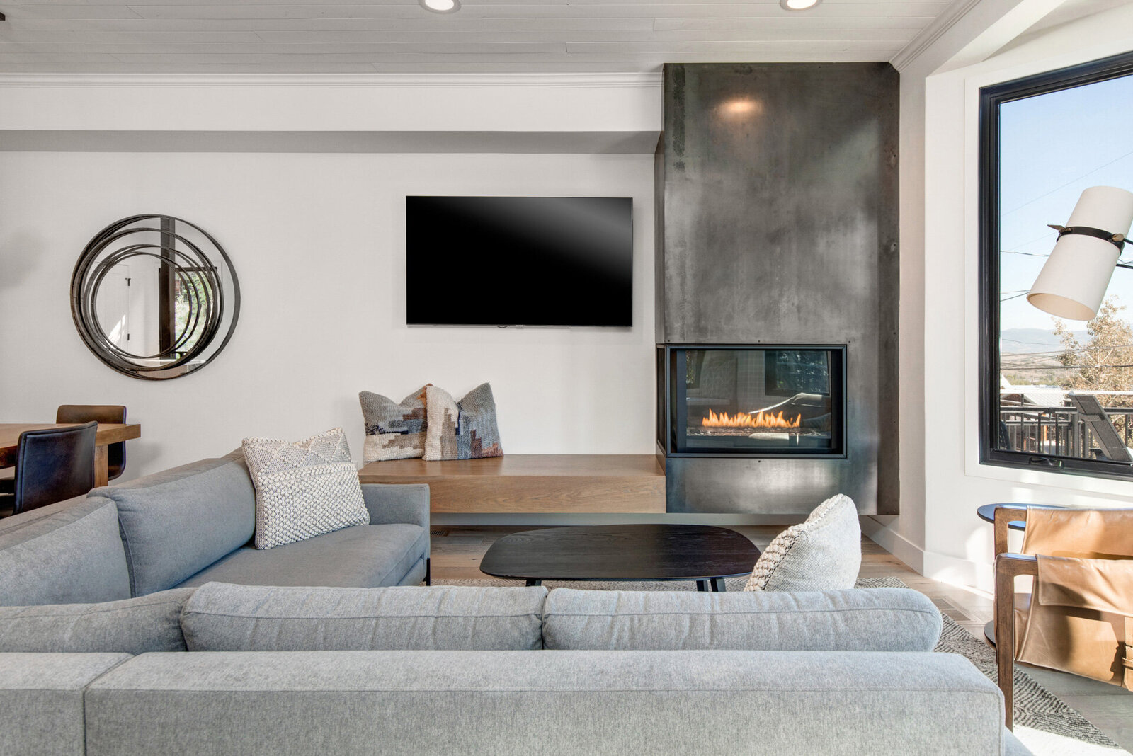 Heber-City-Interior-Designer-Chalet-and-Co-gray-modern-dining-room-fireplace