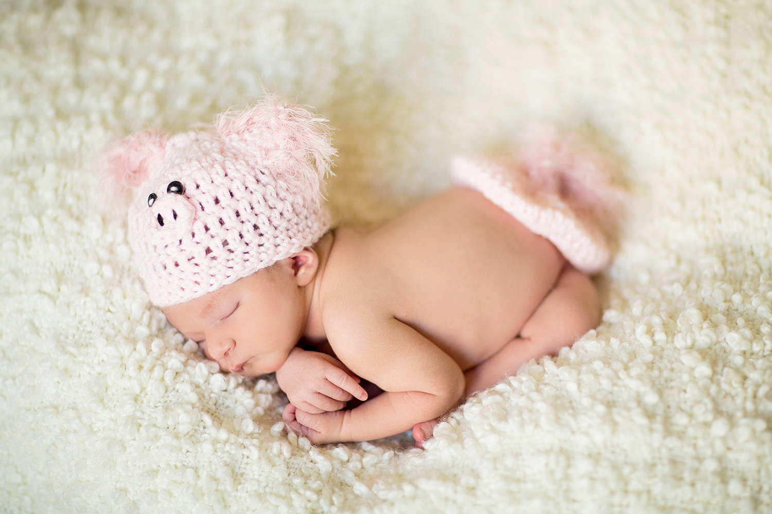 san diego newborn photography | newborn with pink hat and feathers and teddy bear