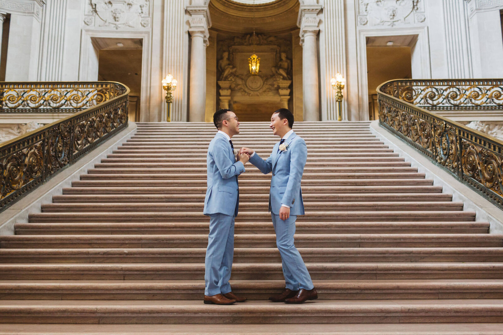 queer couple on Grand Staircase