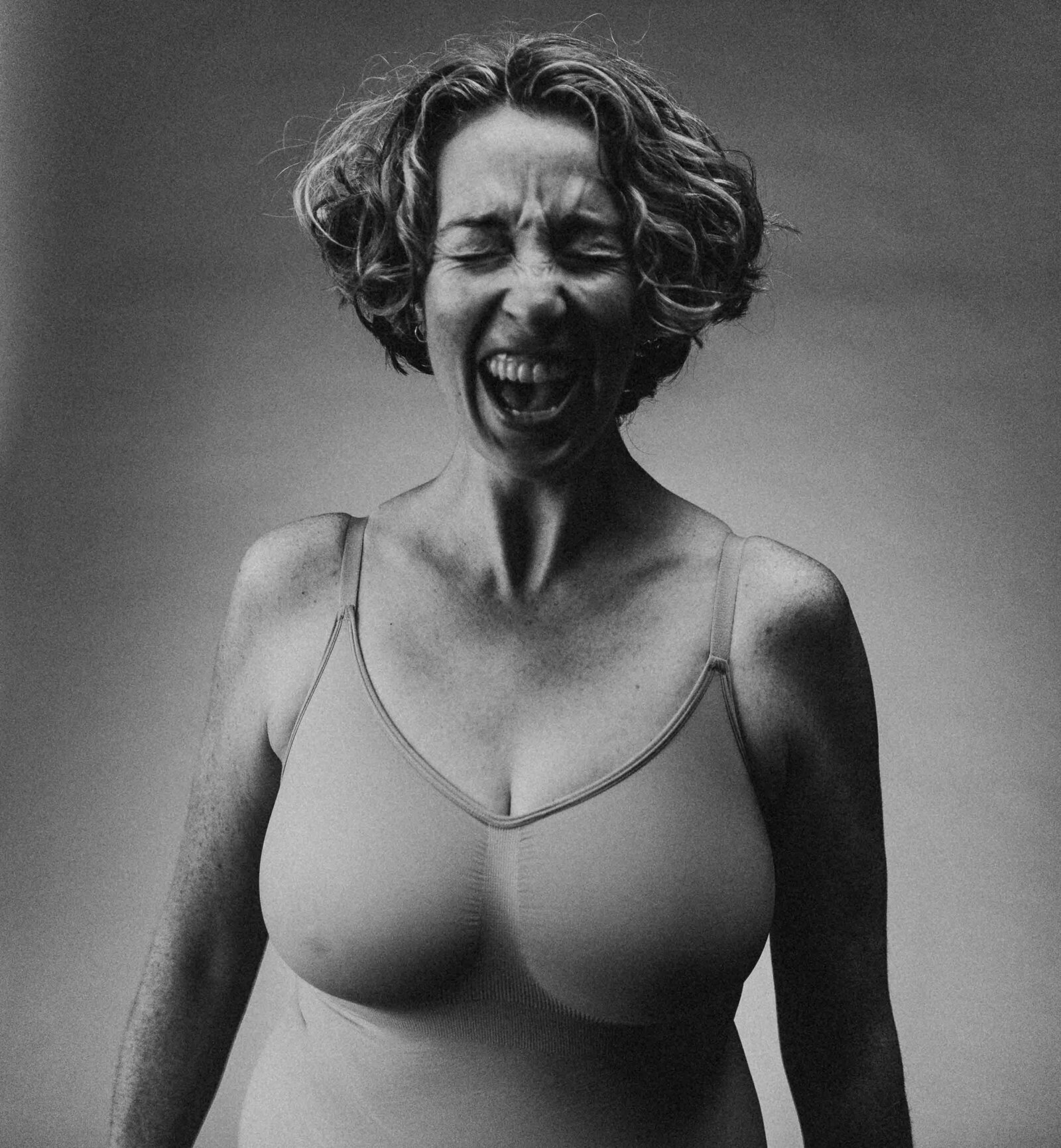black and white photo of a shouting woman
