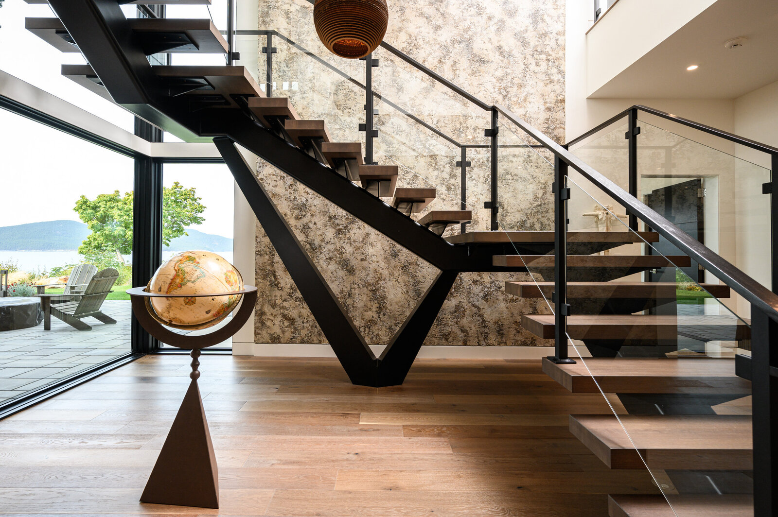 modern staircase with ocean views