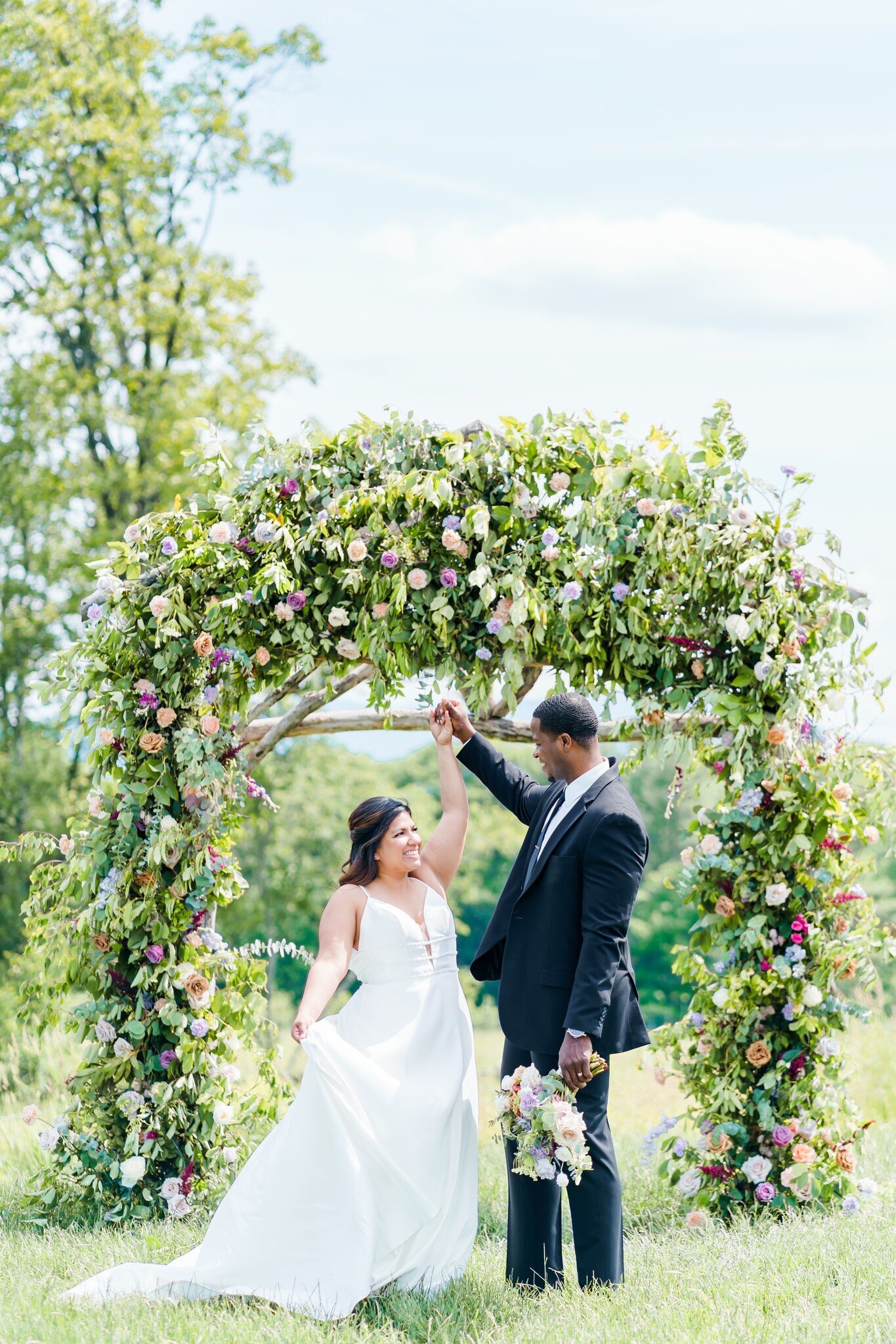 Mayfair Farm Wedding Ceremony with bride and groom dancing