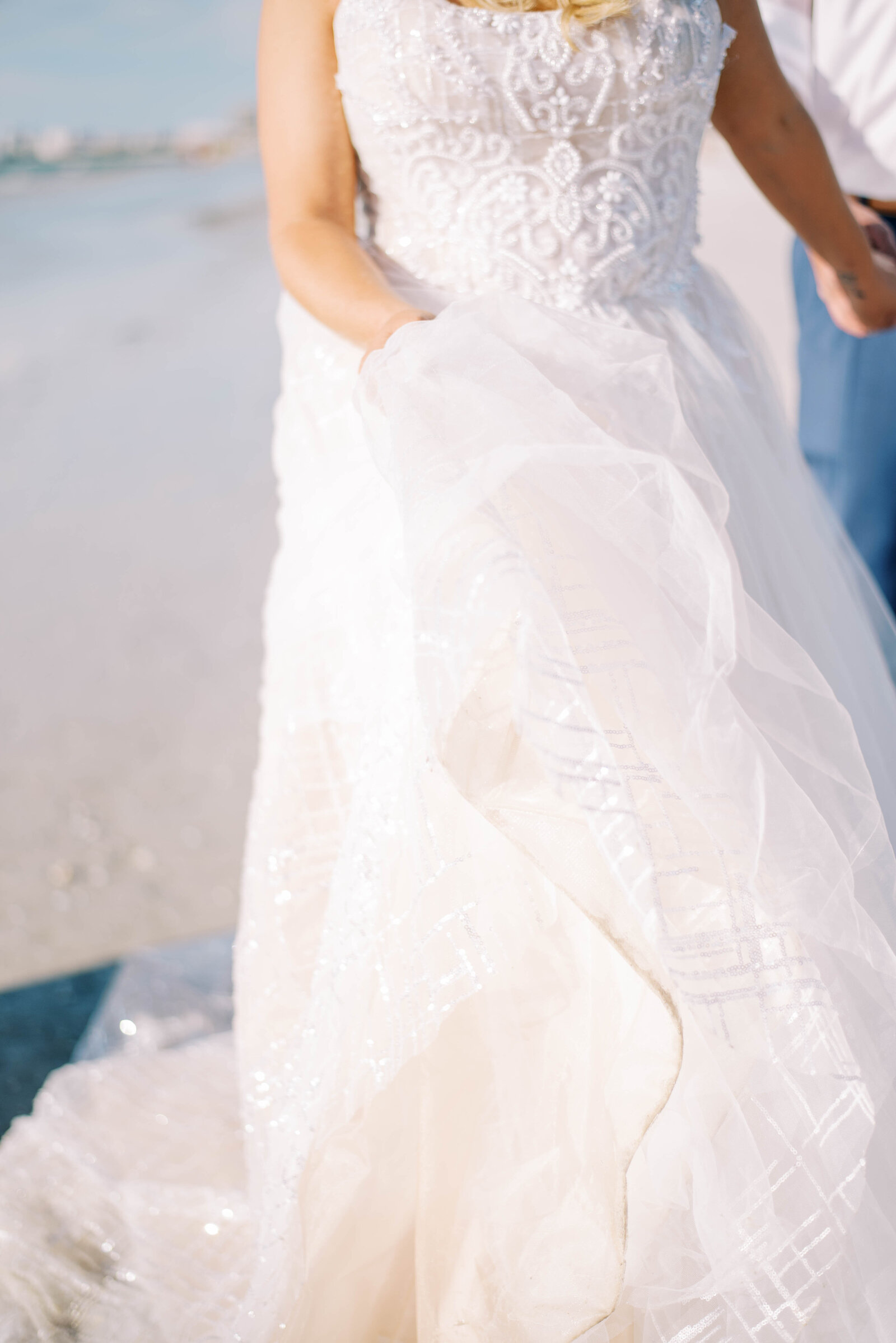 detail shot of wedding dress lace and chiffon dress