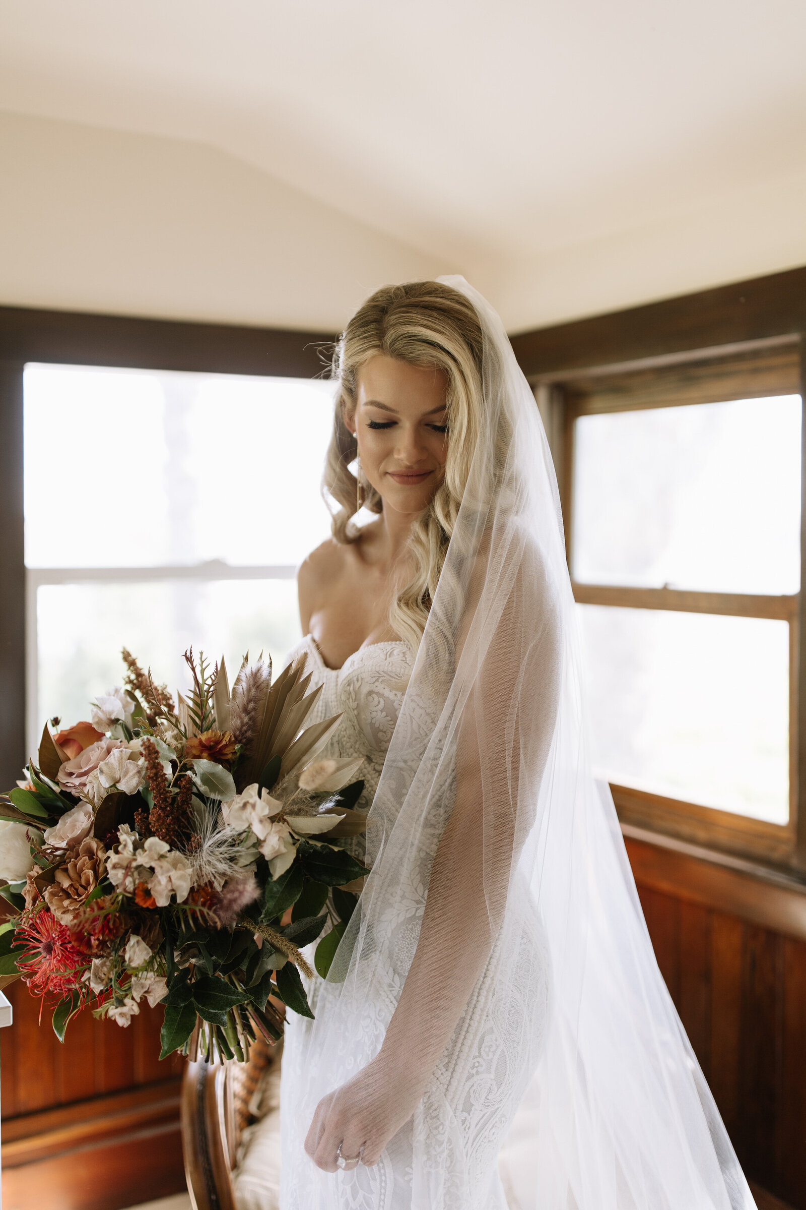 Bride posing with bouquet and veil at McCall, Idaho wedding