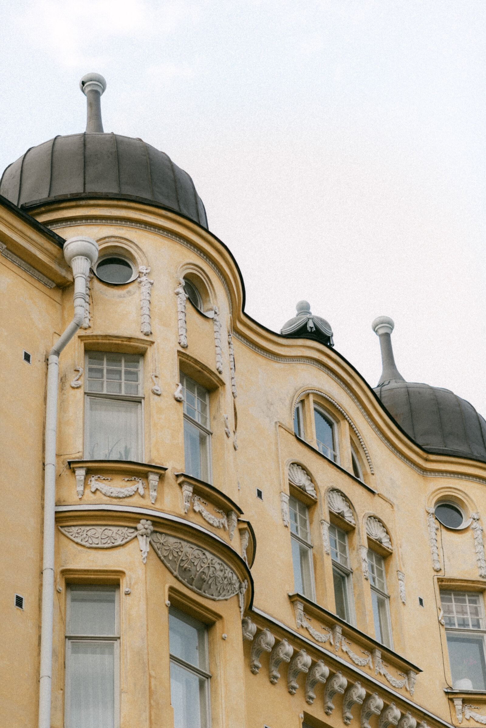 Yellow decorated old building in Helsinki