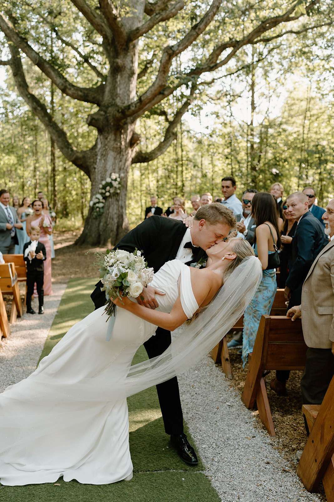 Experience the breathtaking moments from Stephanie and Grant Yeater’s wedding at Retreat 21 in Marysville, OH. This stunning outdoor oasis served as the perfect backdrop for their elegant celebration. From heartfelt vows in the garden-chic ceremony space to the joy-filled reception under panoramic views, every detail was thoughtfully curated for an unforgettable day. Explore their wedding gallery to relive these magical moments, captured with love and attention to every unique aspect of their day.