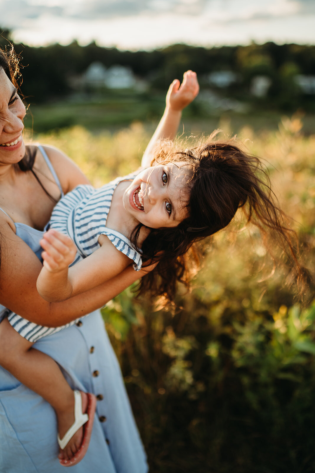 toddler girl bends backward