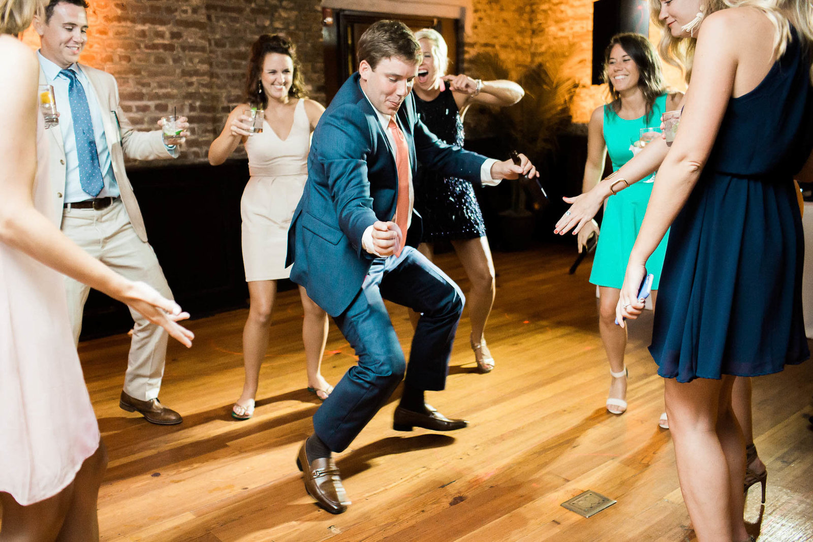 Guests dance at reception, Rice Mill Building, Charleston, South Carolina