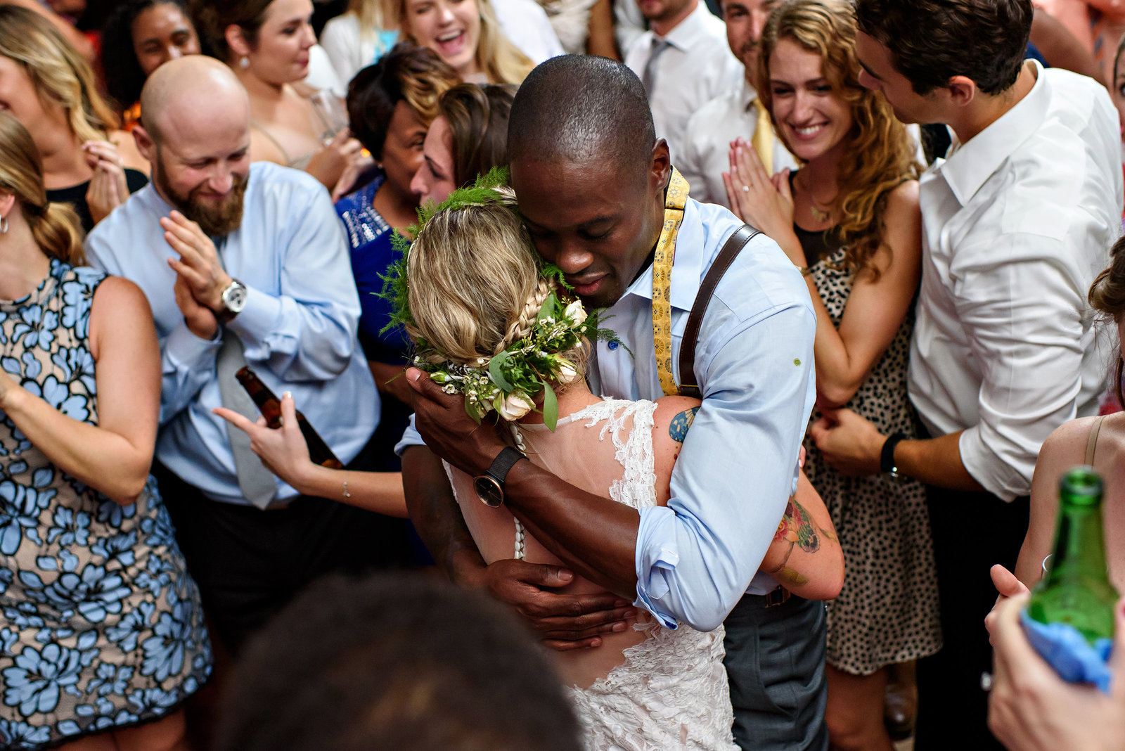 A loving embrace from a groom to his bride during the last song at their reception in Baltimore, MD.