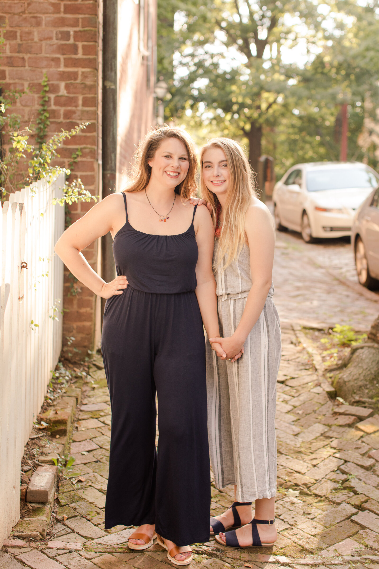 Sisters standing in downtown old salem