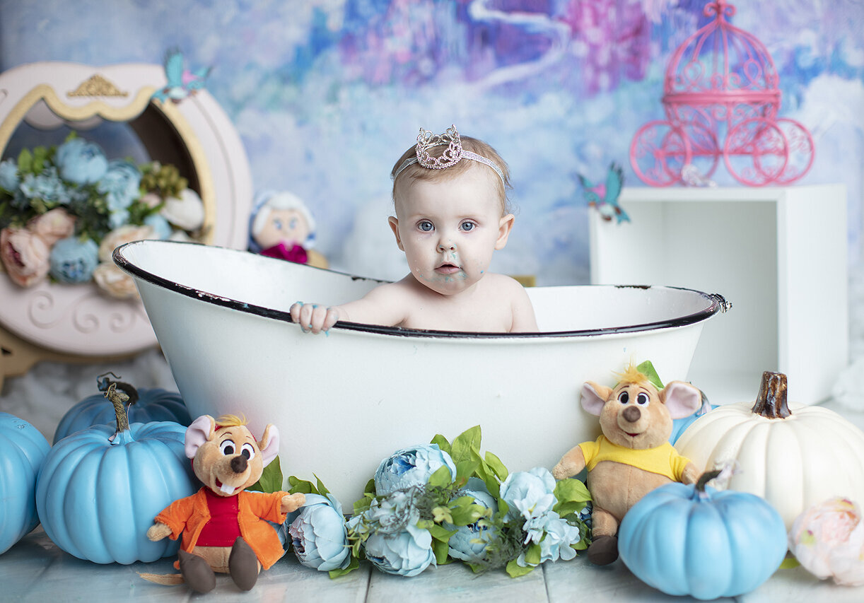 Baby girl in tub at her 1st birthday photoshoot.