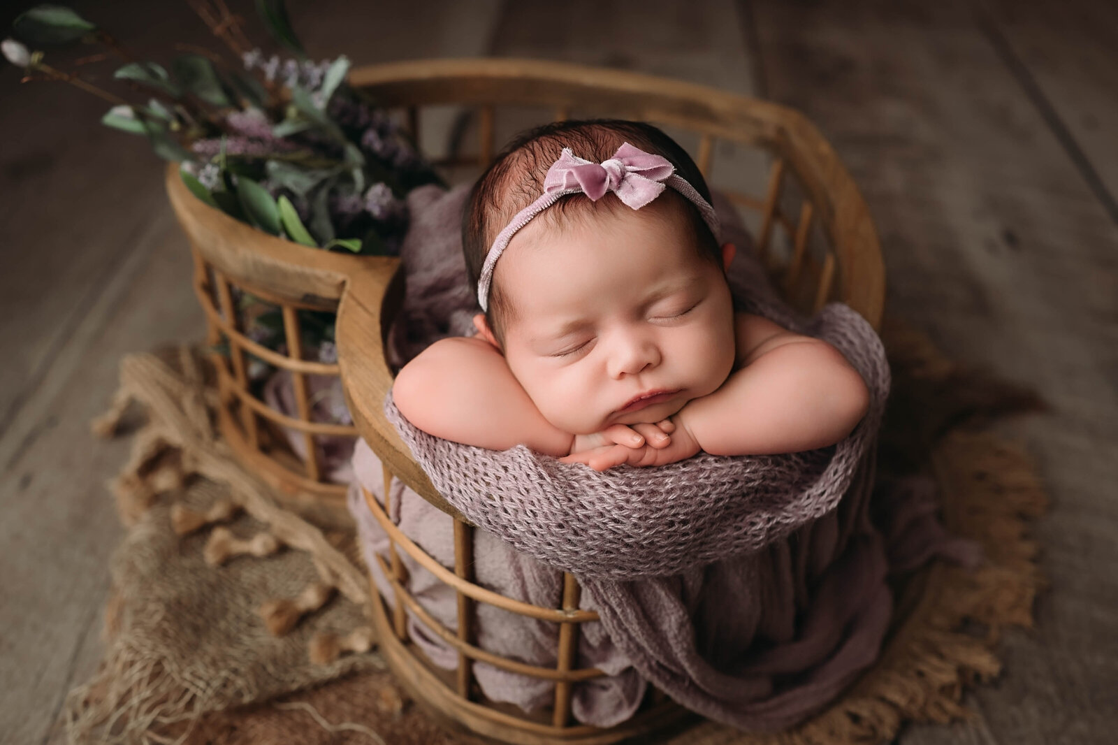 the sweetest pose for newborns and baby sleeping peacefully while Paula Goforth Photography of Fort Worth, Texas captures this beautiful image for mom and dad