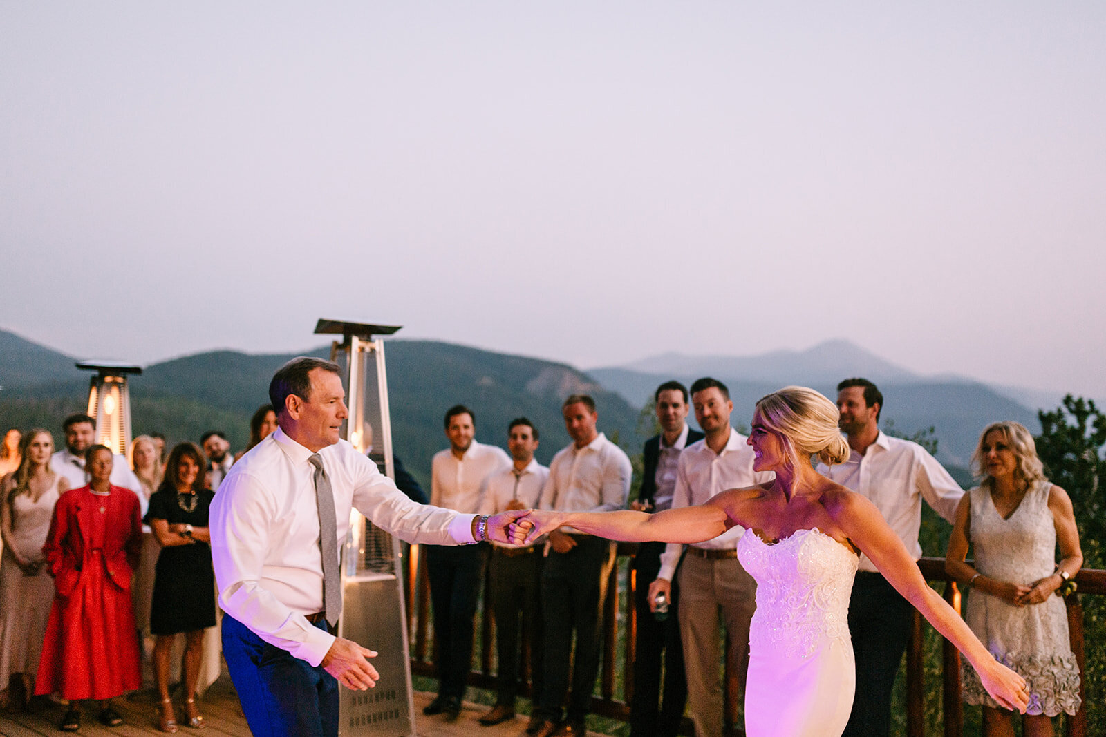 father daughter dance in with mountain views