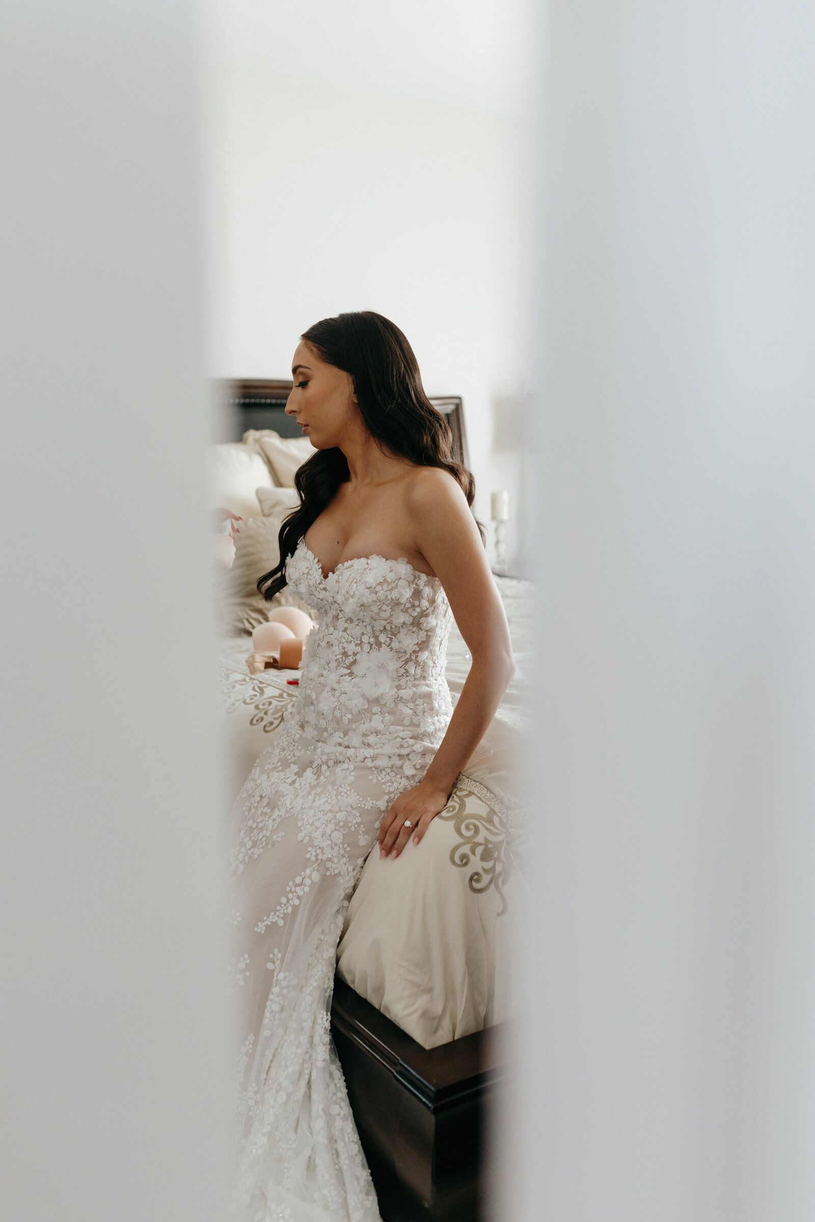 A behind the scenes look the bride in a gorgeous beaded lace wedding gown | Emma LeeAnn Photography