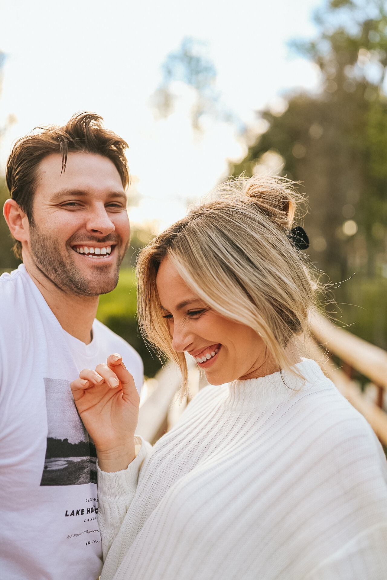 Tori and Chad Masters laughing during couples session
