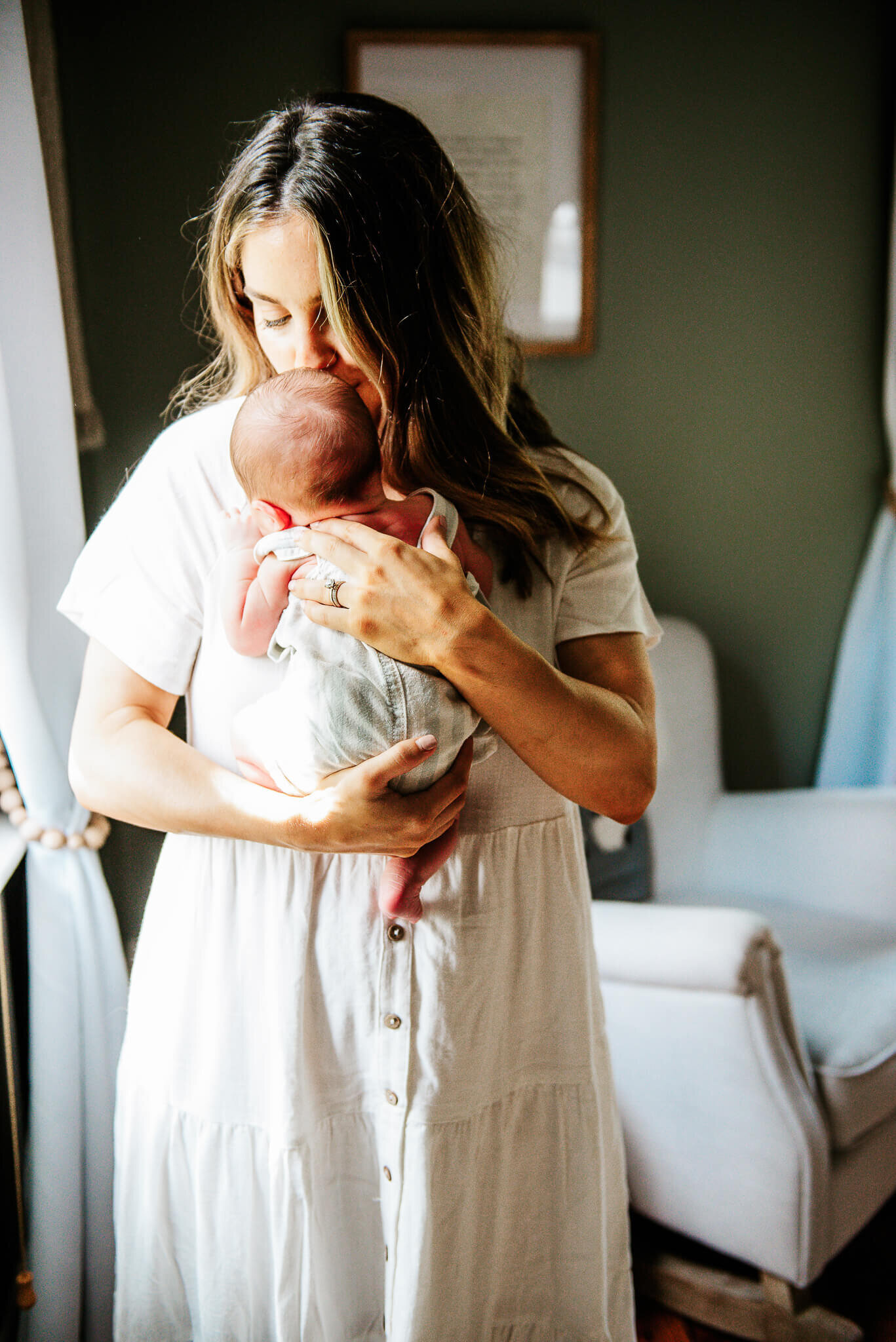 mother holding baby