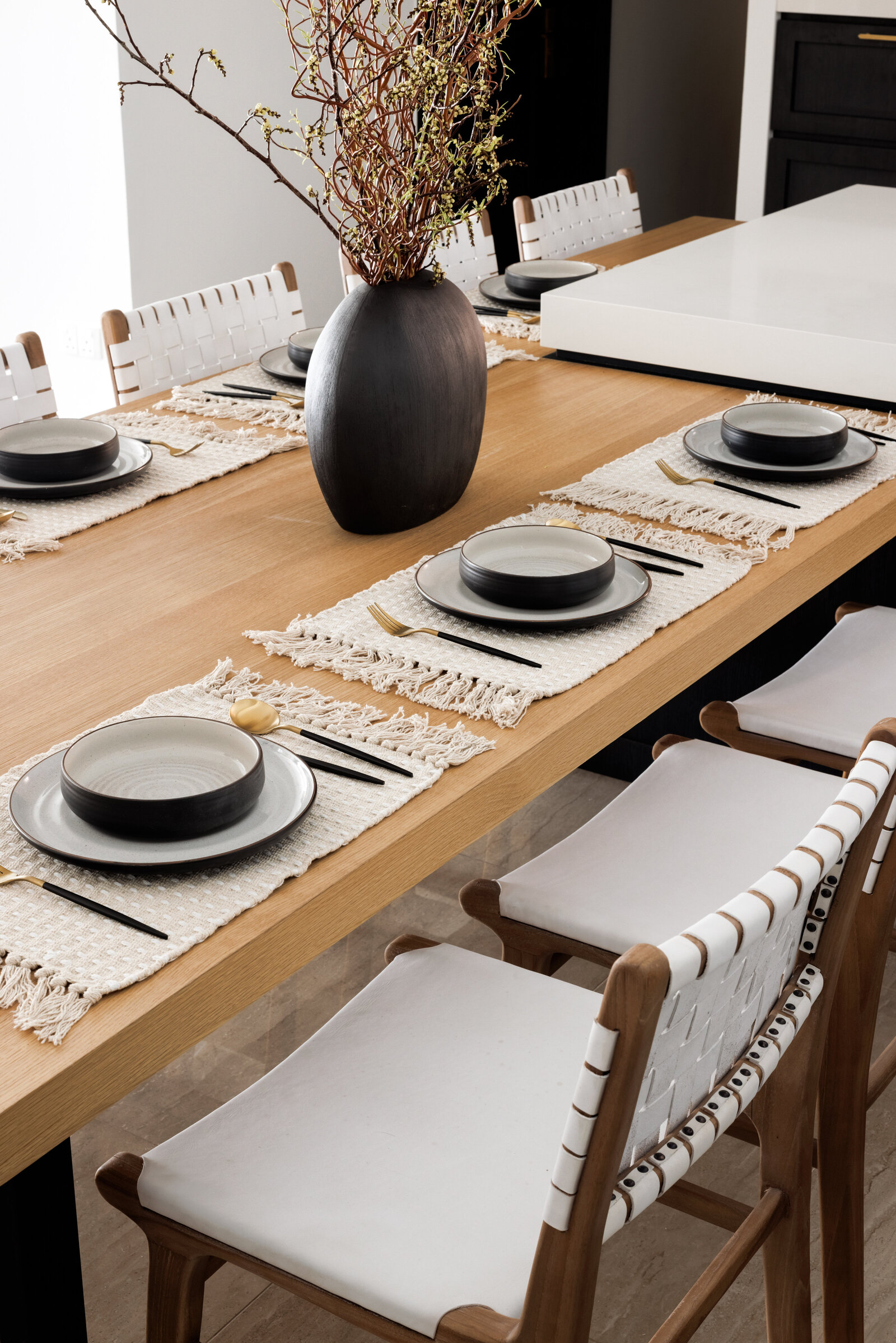 black & white kitchen design with stools