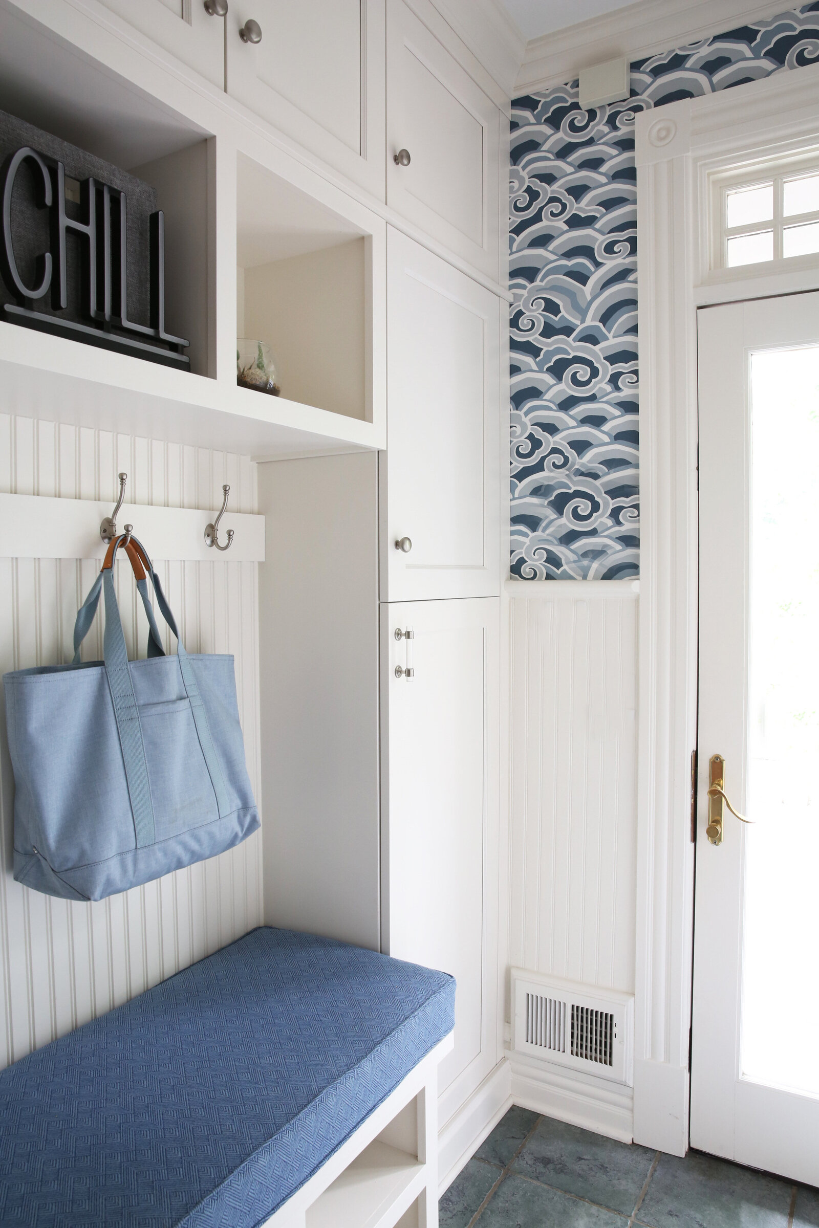 BUILT-IN-MUDROOM-WITH-BLUE-CUSTOM-CUSHION