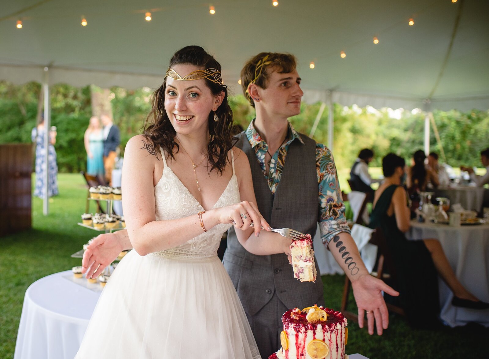 couple cutting cake at intimate wedding