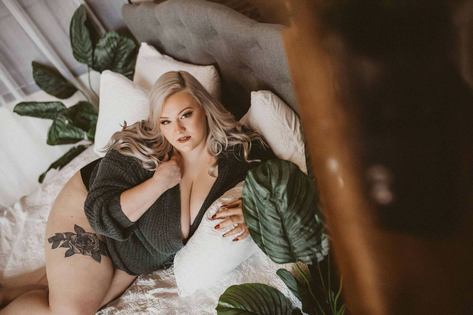portrait of a woman in nature themed studio