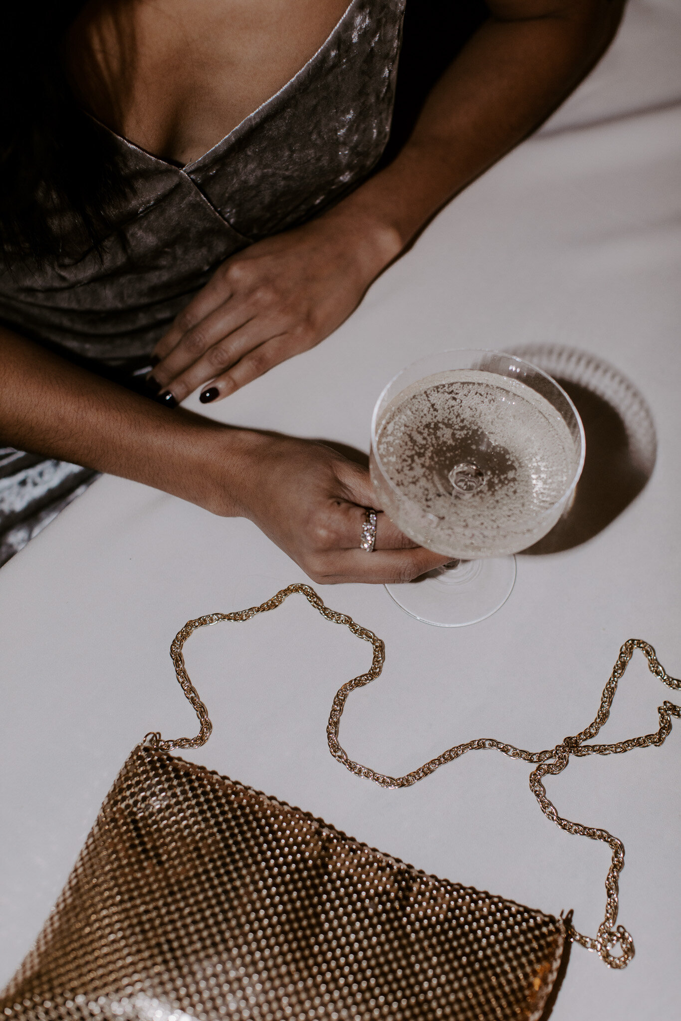 Wedding guest enjoying a champagne at the reception