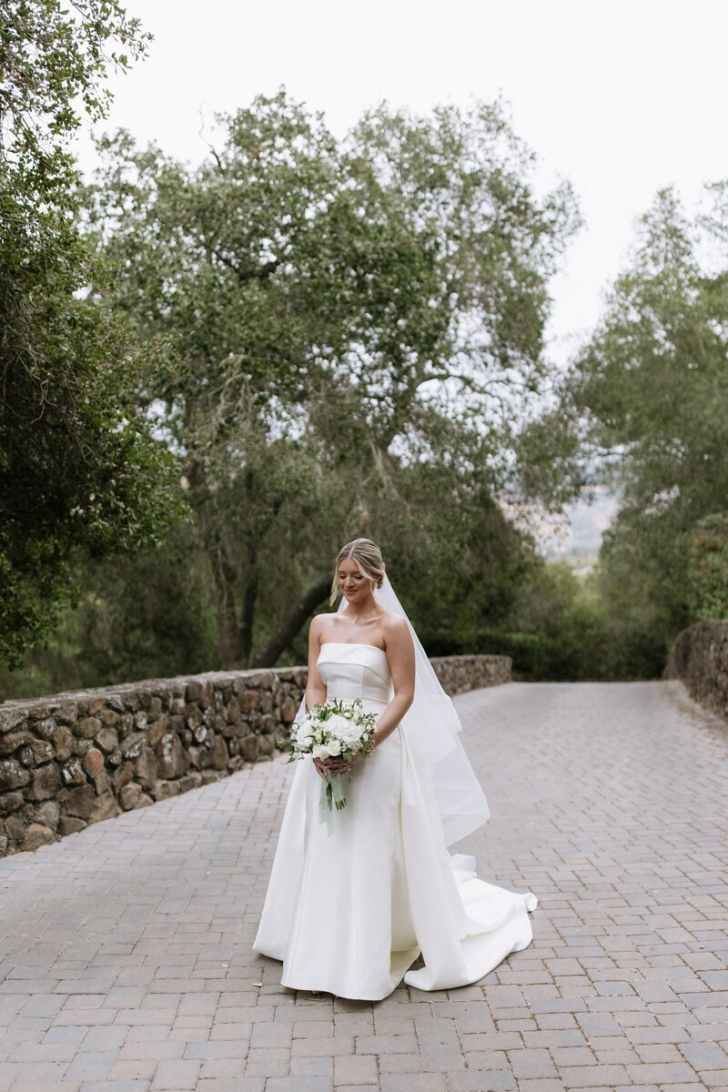 Bride holding bouquet taken by elopement photographer washington state Erica Rochelle Photography