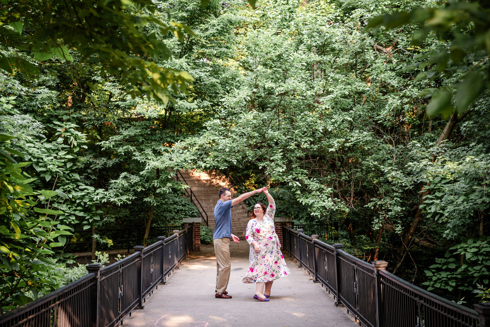 Couple on bridge dancing