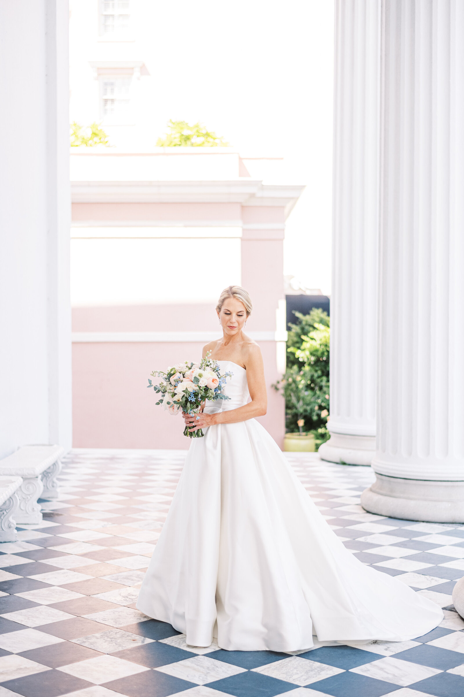 sophisticated summer bridal portrait downtown Charleston SC Hibernian Hall