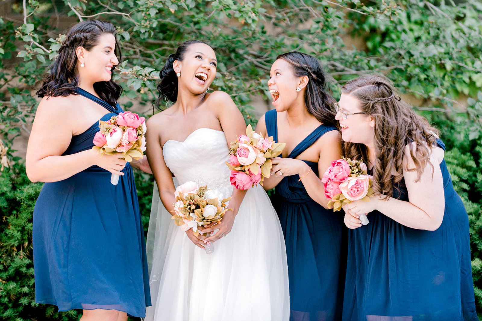 bride with bridesmaids in Chcago universioty picture by Chicago wedding photographer