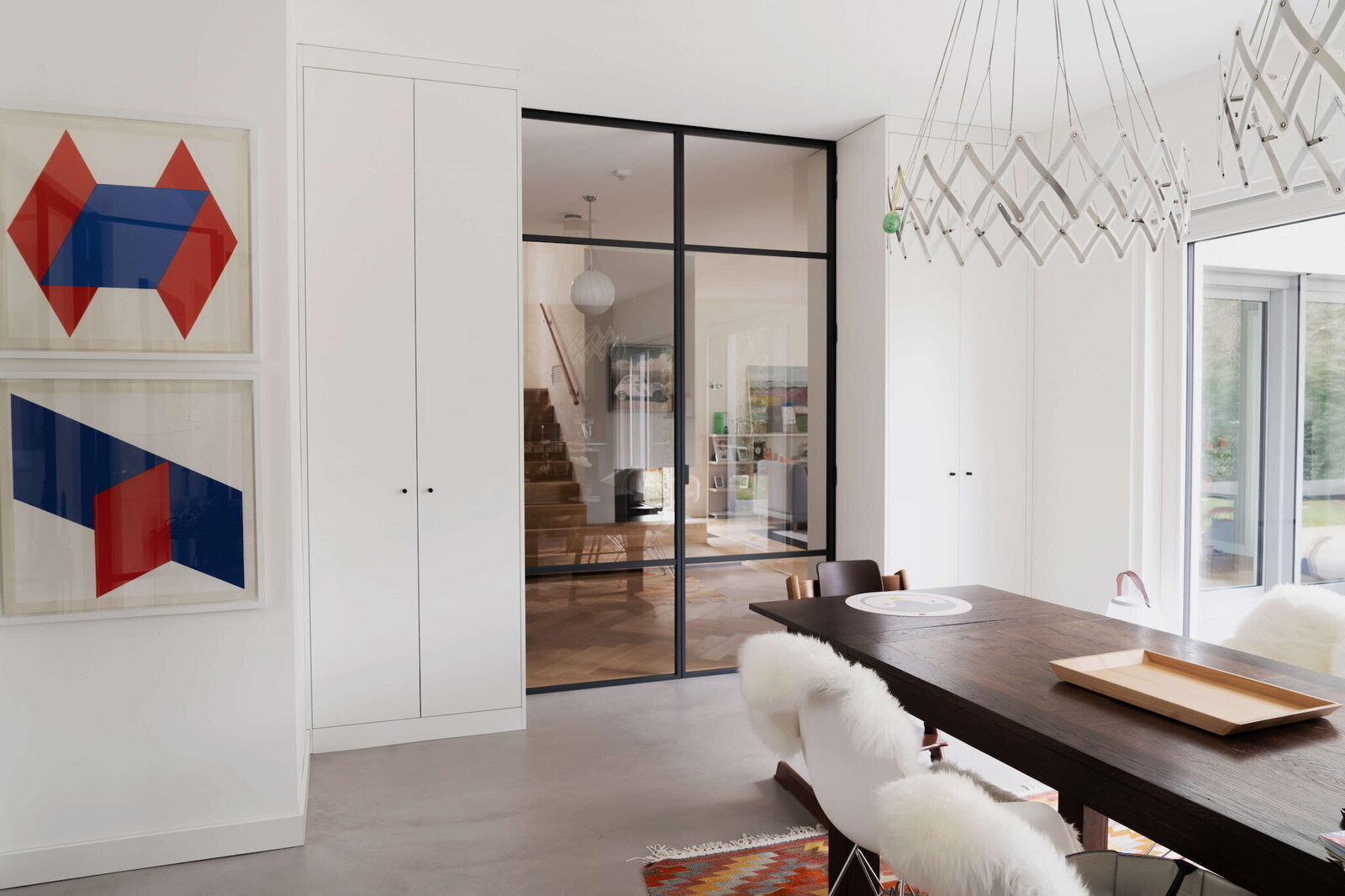 metall-glas-tueren-wohnzimmer-adam-innenausbau