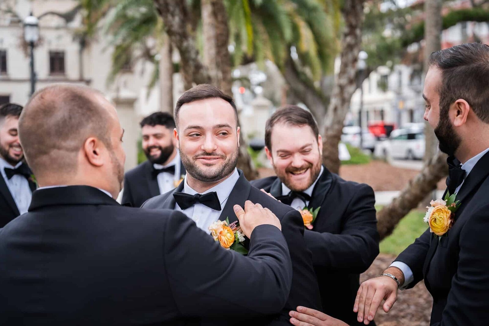 groom and groomsmen candid photos at jewish wedding at Casa Monica in St Augustine wedding Venue