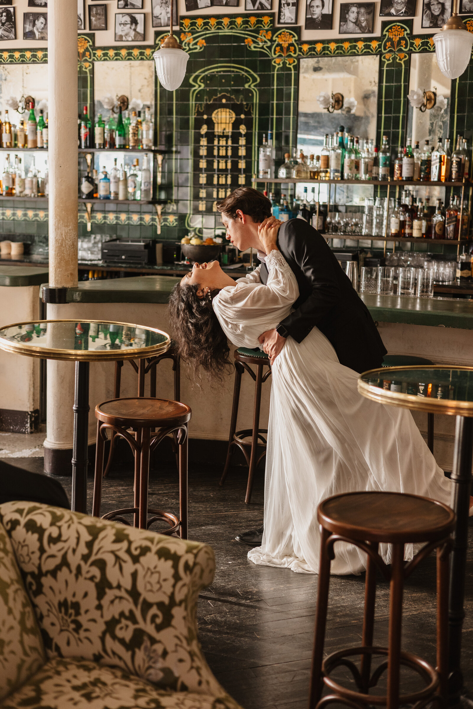 Groom dipping bride in romantic gesture during reception at Deux Chats in Williamsburg, New York | Emma LeeAnn Photography
