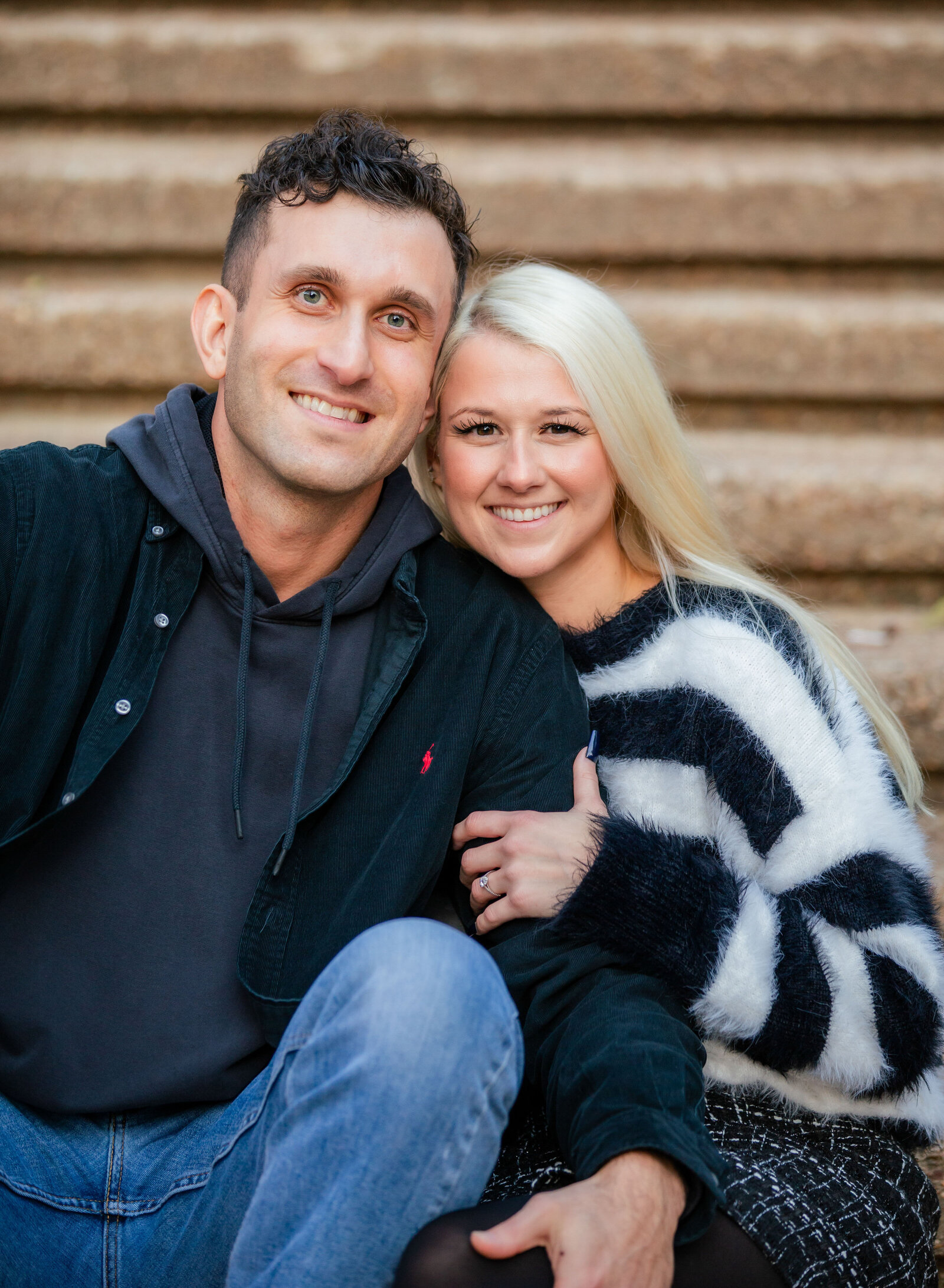 seated couple smiling