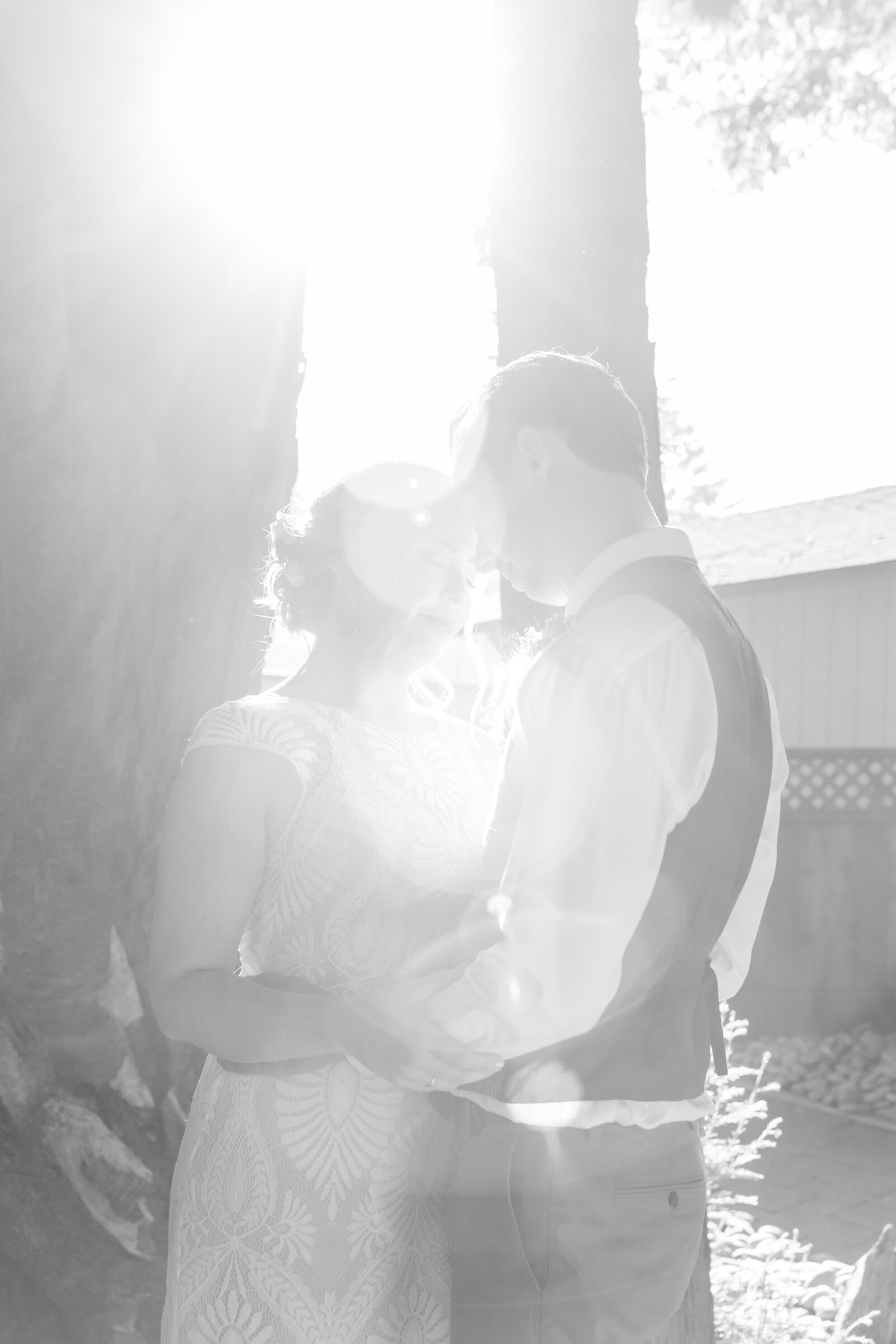 Bride and groom on their colorful wedding day in Santa Cruz, California in the redwood trees.