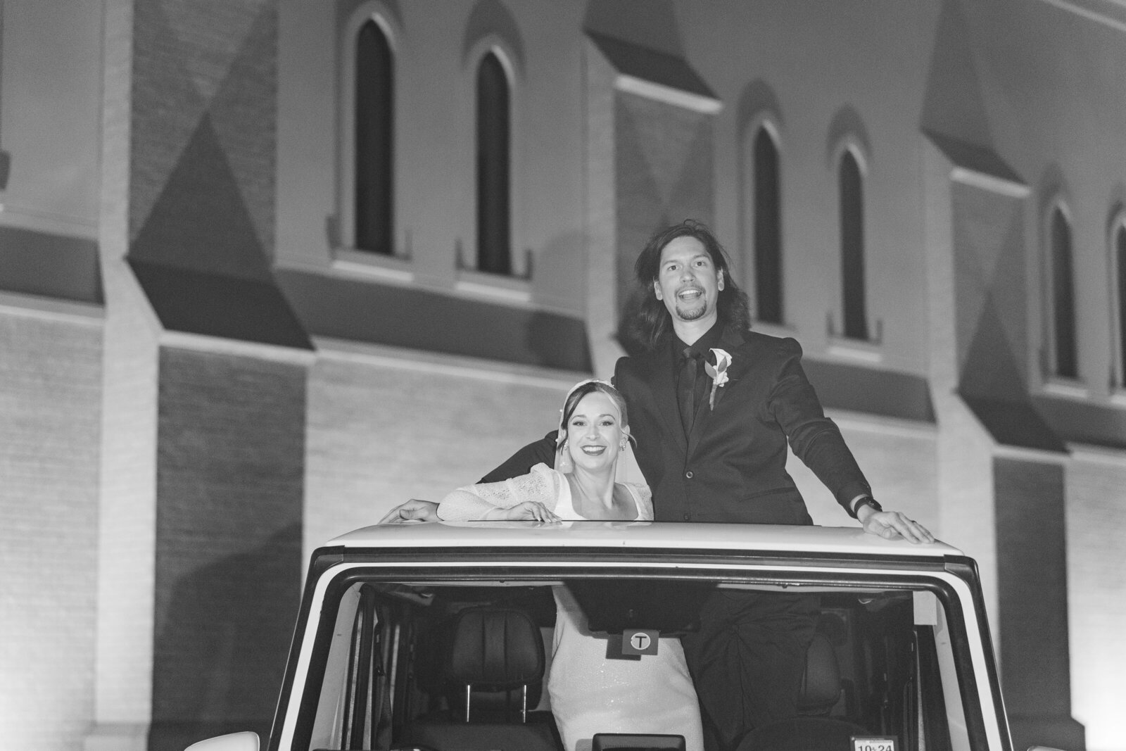 Bride-and-groom-jeep-exit