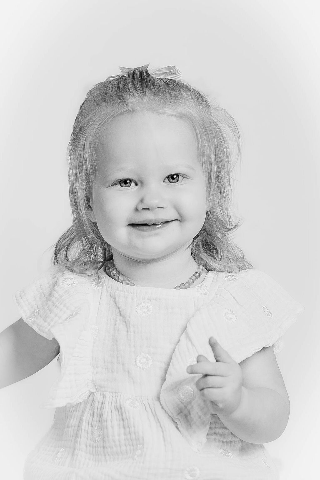 Close up of baby during first birthday milestone photo session in Mooresville NC