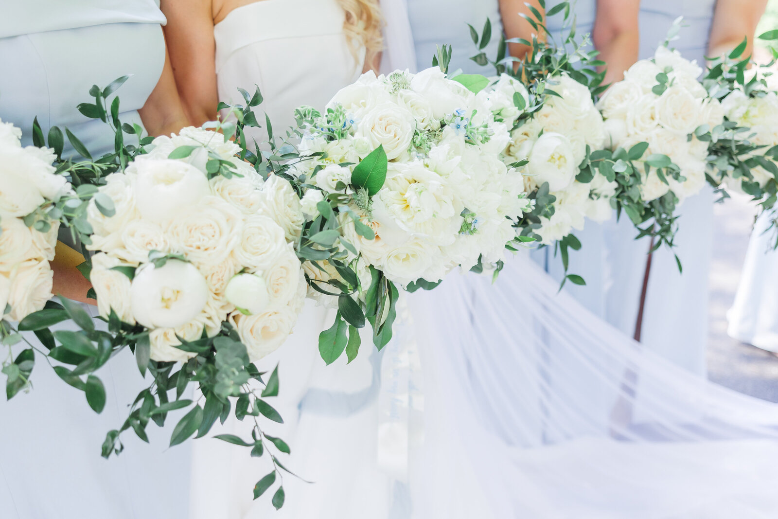line of blue white bridesmaid bouquets baltimore wedding
