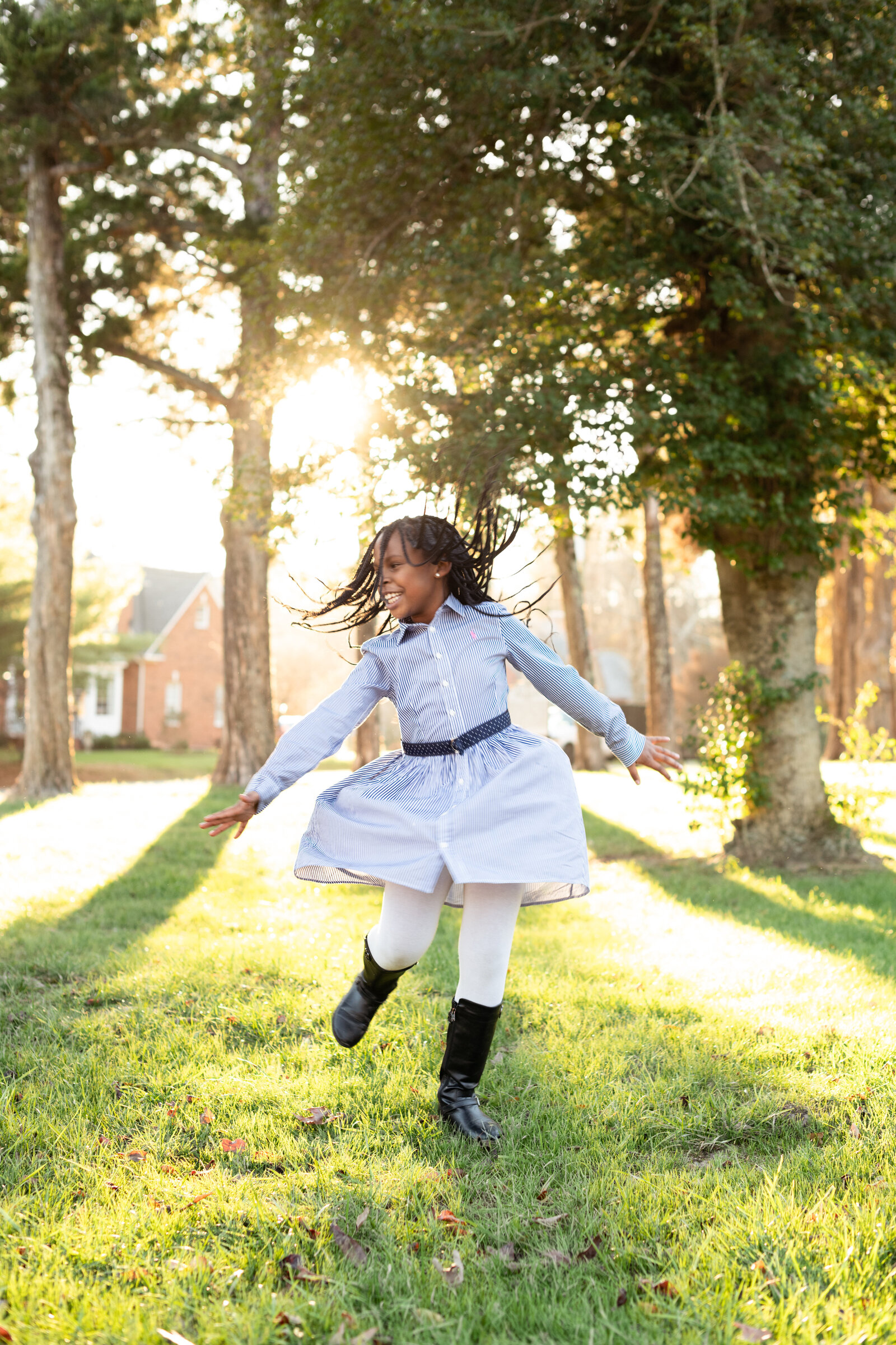 child twirling photo