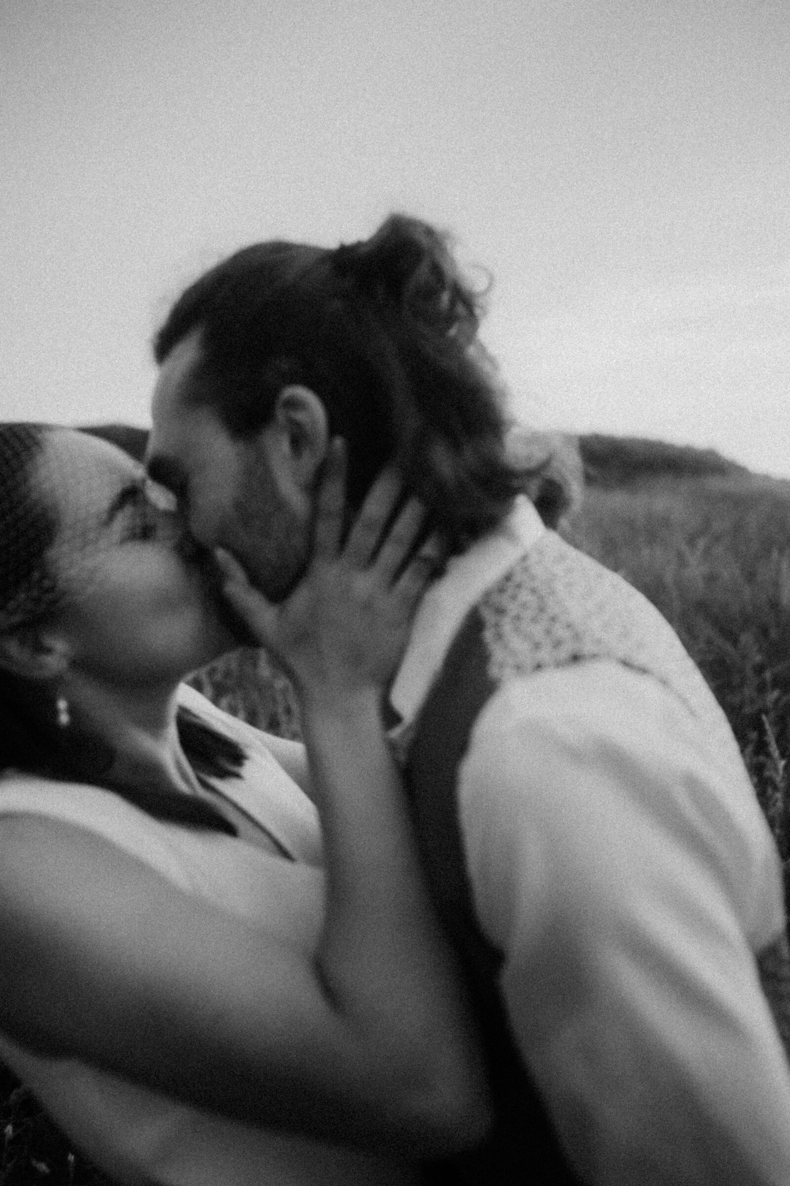 Lovely picture of a couple tenderly kissing each other during an engagement session