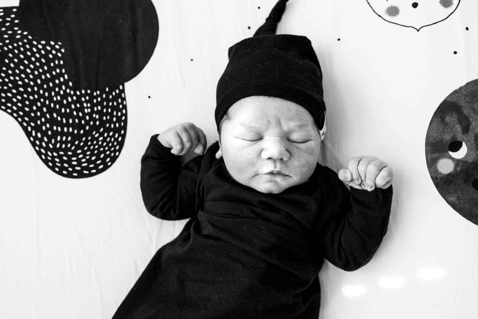 london-ontario-newborn-photography-black-outfit-closeup-crib-sheet